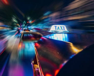 yellow taxi time lapse photography
